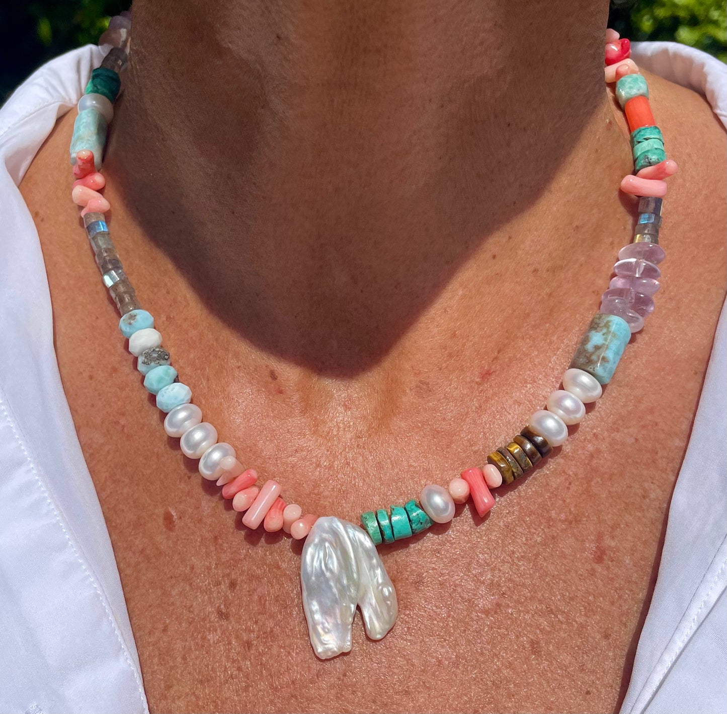 Mixed gemstones and a freshwater pearl necklace